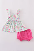 Adorable girl's bloomer set with vibrant meadow print, perfect for sunny days.