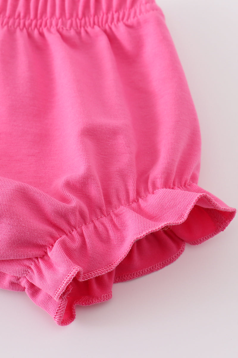 Adorable girl's bloomer set with vibrant meadow print, perfect for sunny days.