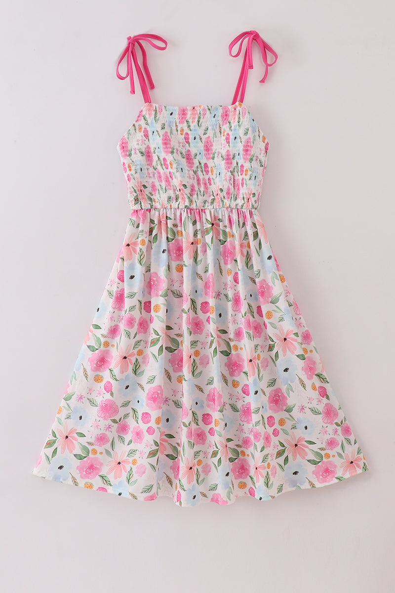 Floral smocked mom dress with pastel blossoms, perfect for spring outings.