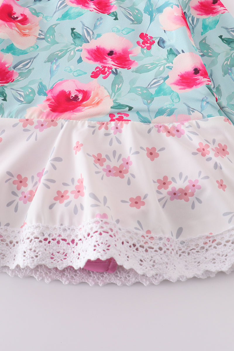 Blushing rose garden print girl one-piece leotard with pink floral pattern.