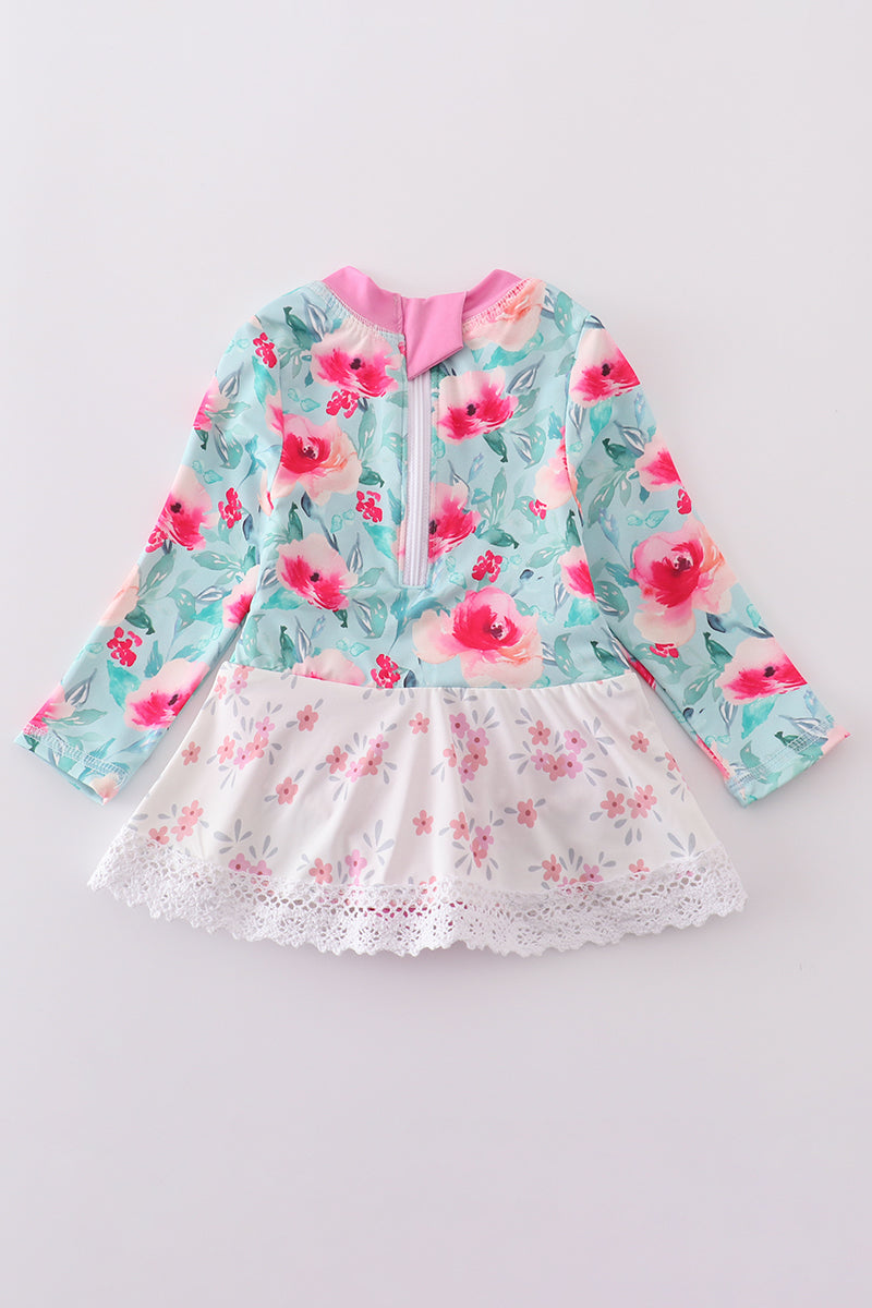 Blushing rose garden print girl one-piece leotard with pink floral pattern.