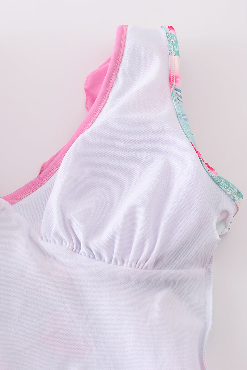 Mom swimsuit with a blushing rose garden print, perfect for sunny beach days.