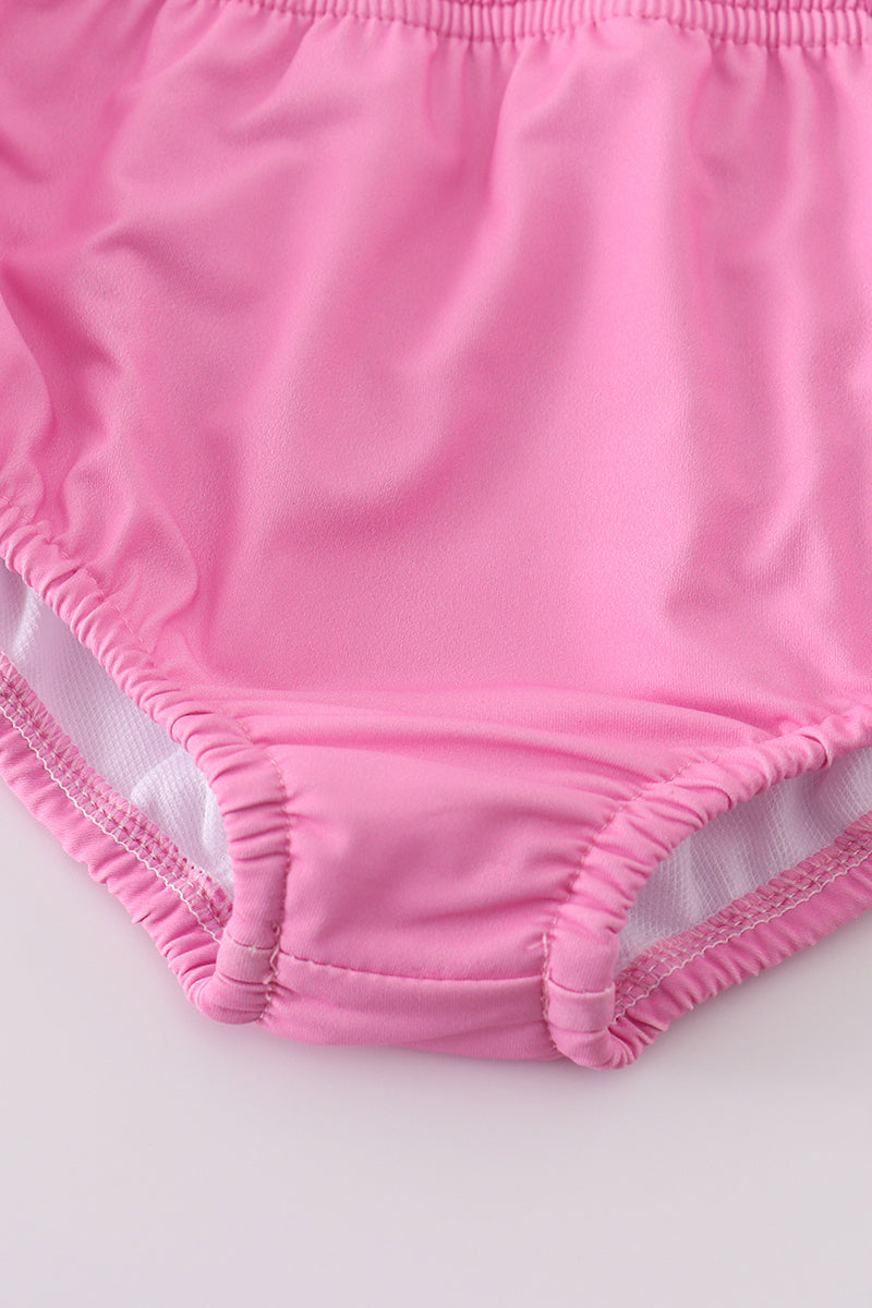 Girl's 2-piece swimsuit with blushing rose garden print, perfect for summer fun.