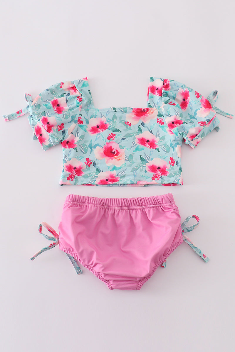Girl's 2-piece swimsuit with blushing rose garden print, perfect for summer fun.