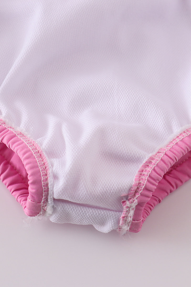 Girl's 2-piece swimsuit with blushing rose garden print, perfect for summer fun.