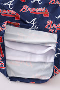 Matching navy swim trunks with Atlanta Braves logo for dad and son.