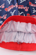 Matching navy swim trunks with Atlanta Braves logo for dad and son.