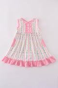 Pink floral print girl ruffle dress with short sleeves and a twirl-ready skirt.