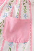 Pink floral print girl ruffle dress with short sleeves and a twirl-ready skirt.