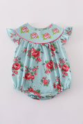 Smocked girl bubble with charming rosebud print, perfect for playful summer days.