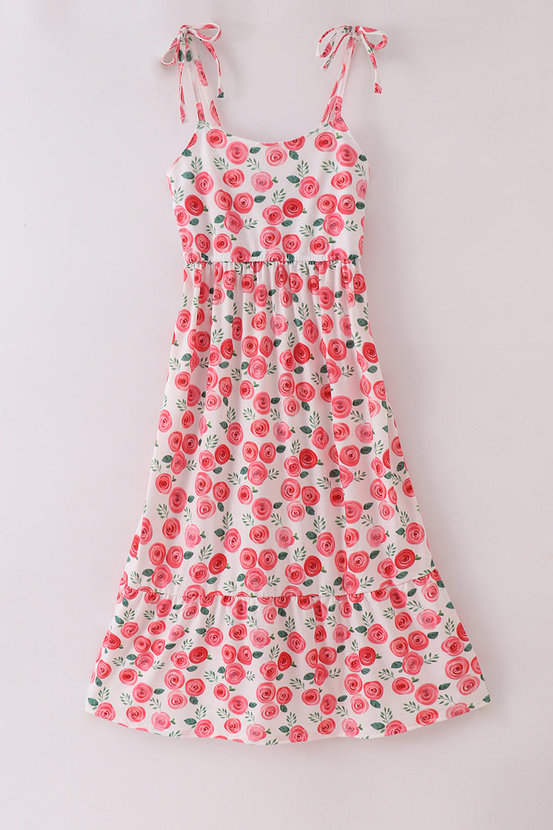 Pink floral print mom dress with playful blooms, perfect for spring outings.
