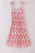 Pink floral print mom dress with playful blooms, perfect for spring outings.