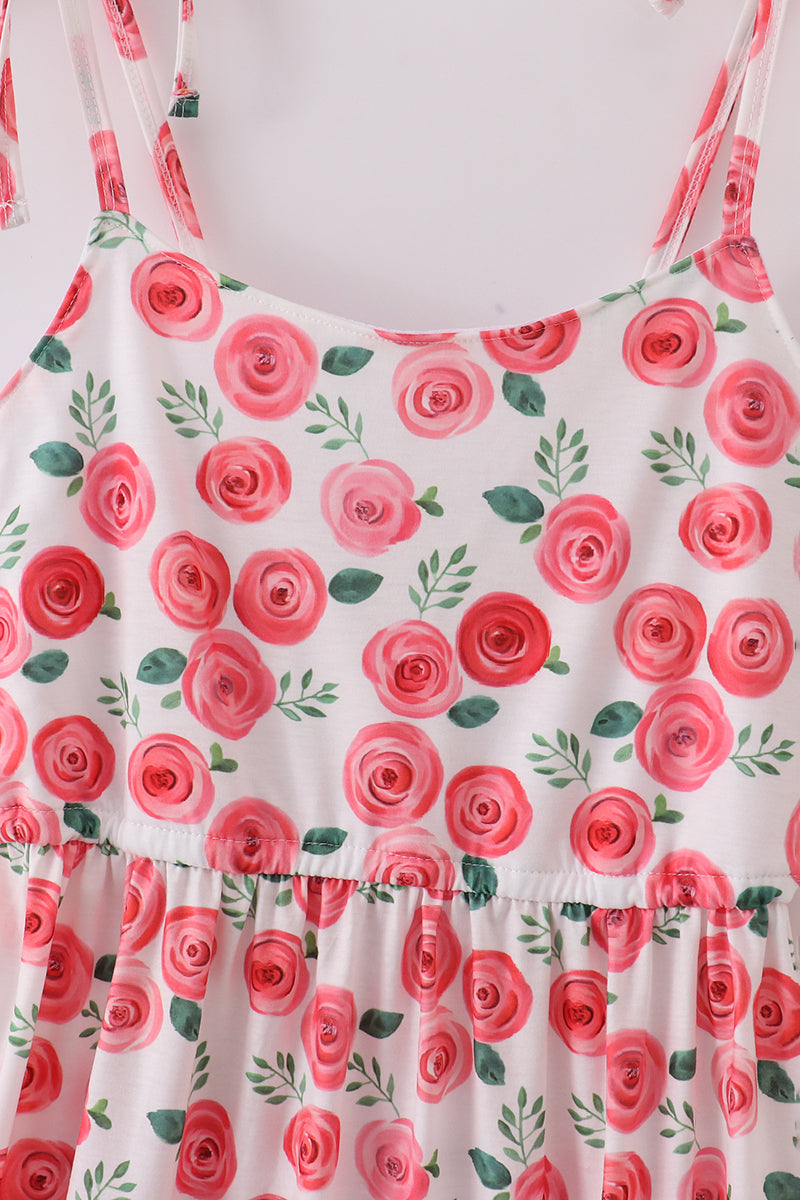 Pink floral print mom dress with playful blooms, perfect for spring outings.