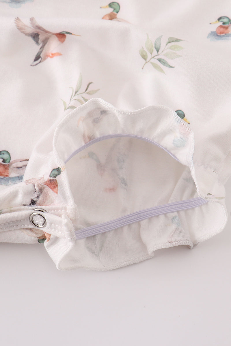 Adorable green bubble romper with playful duck print, perfect for toddlers.
