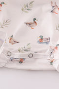 Adorable green bubble romper with playful duck print, perfect for toddlers.