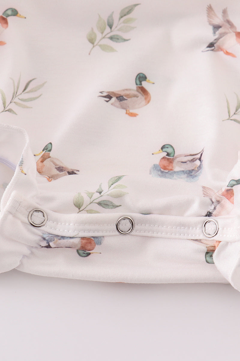 Adorable green bubble romper with playful duck print, perfect for toddlers.