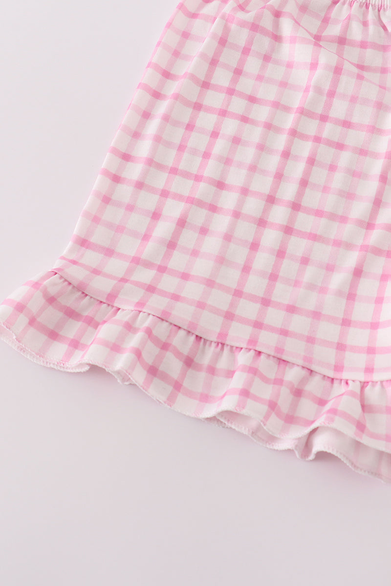 Pink party puppy print set featuring a playful dog pattern on cozy children's pajamas.