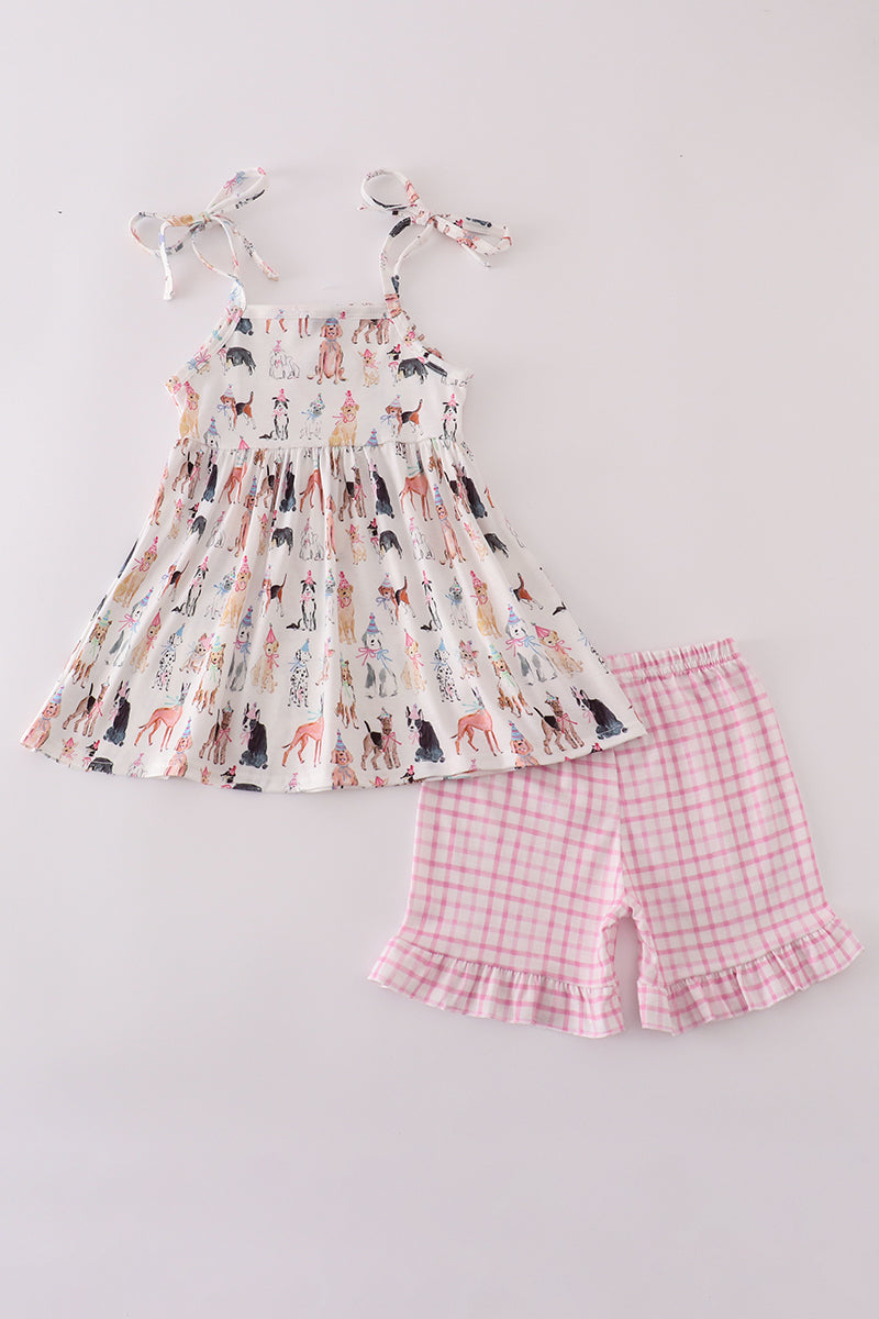 Pink party puppy print set featuring a playful dog pattern on cozy children's pajamas.