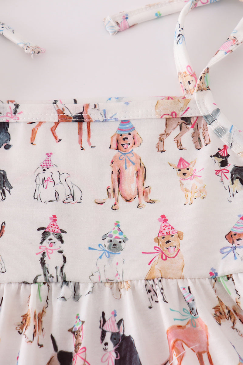 Pink party puppy print set featuring a playful dog pattern on cozy children's pajamas.