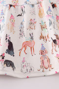 A cute pink dress with playful puppy prints, perfect for parties.