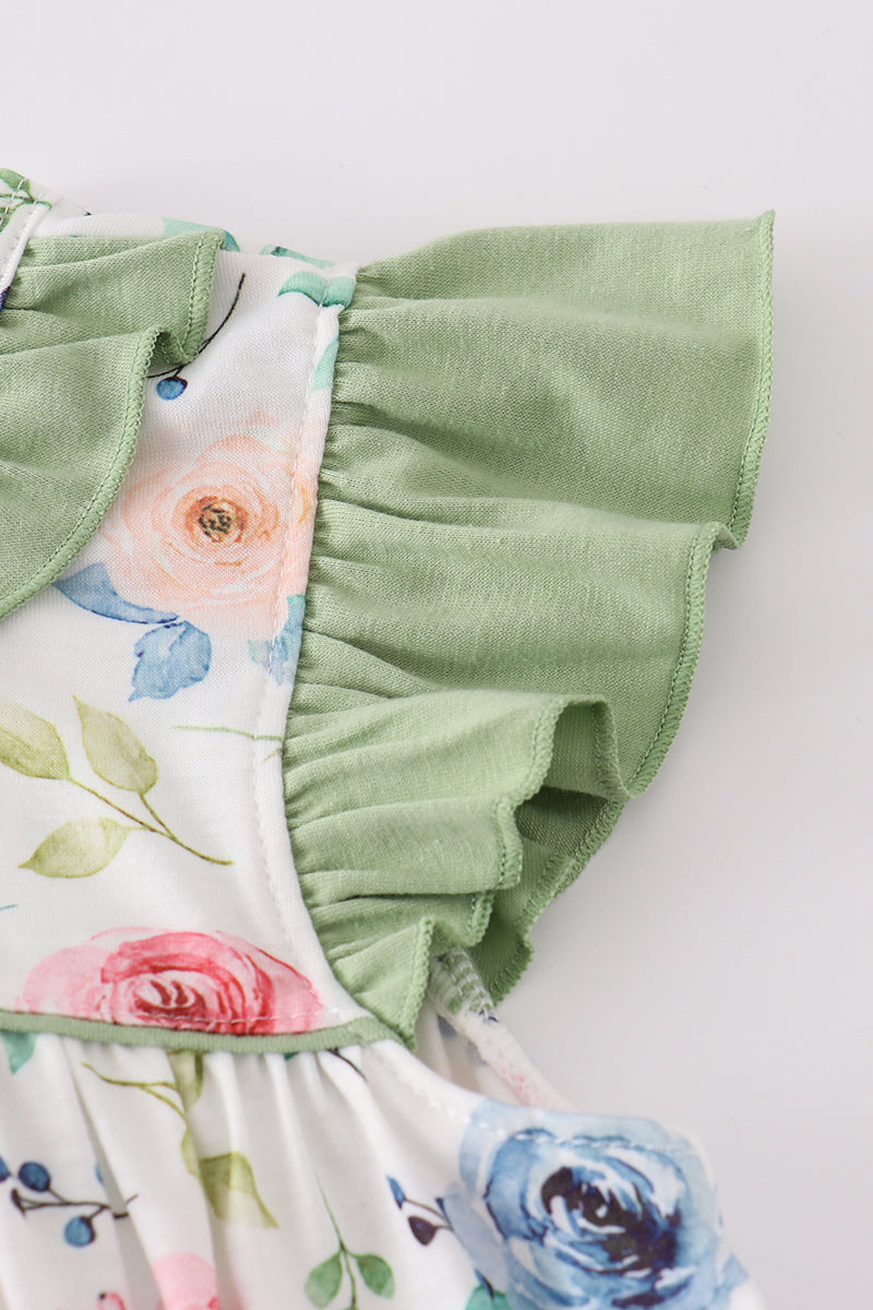 Green garden rose set: vibrant floral top and shorts for playful summer days.