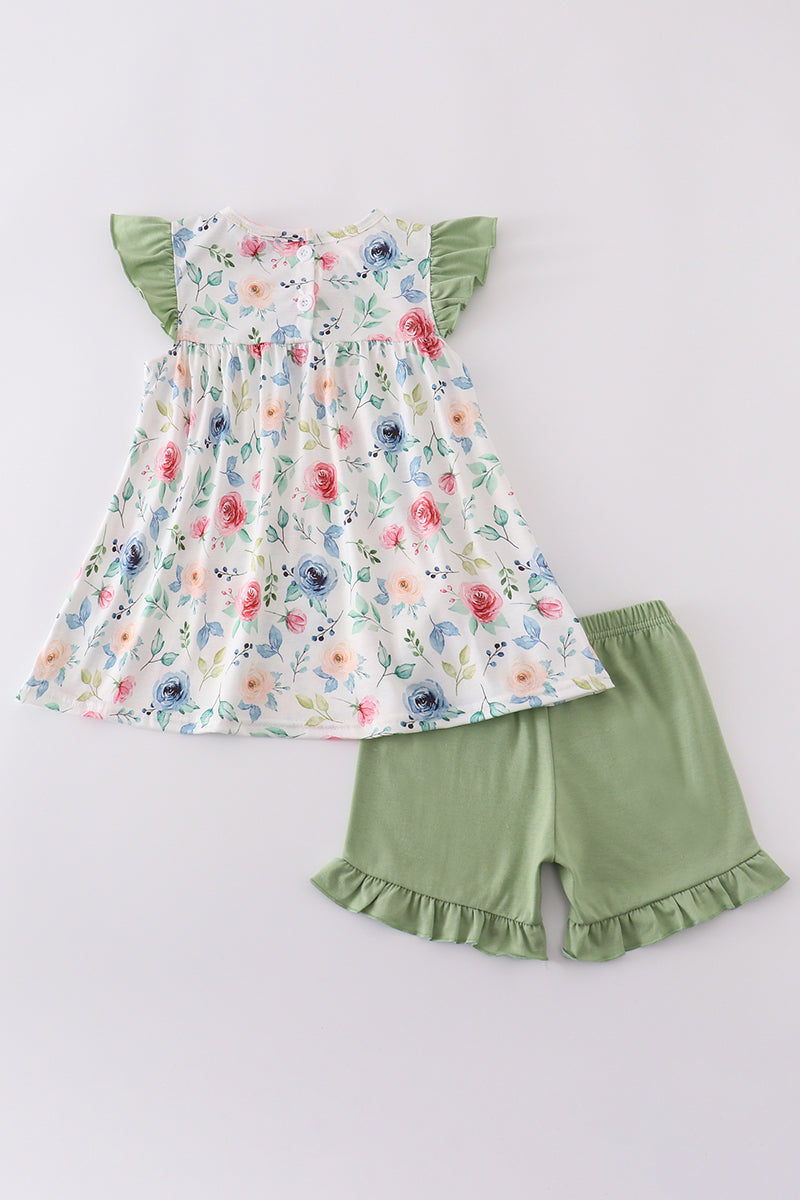 Green garden rose set: vibrant floral top and shorts for playful summer days.