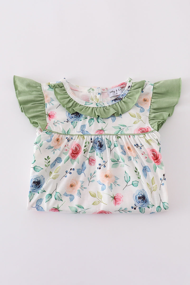 Green garden rose set: vibrant floral top and shorts for playful summer days.