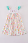 A charming mint dress with ice cream embroidery, perfect for summer fun.