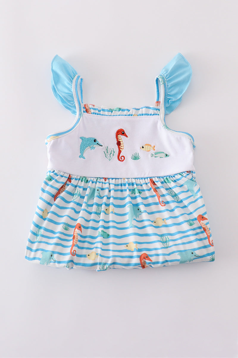 Blue dress with playful marine creature embroidery, perfect for seaside adventures.