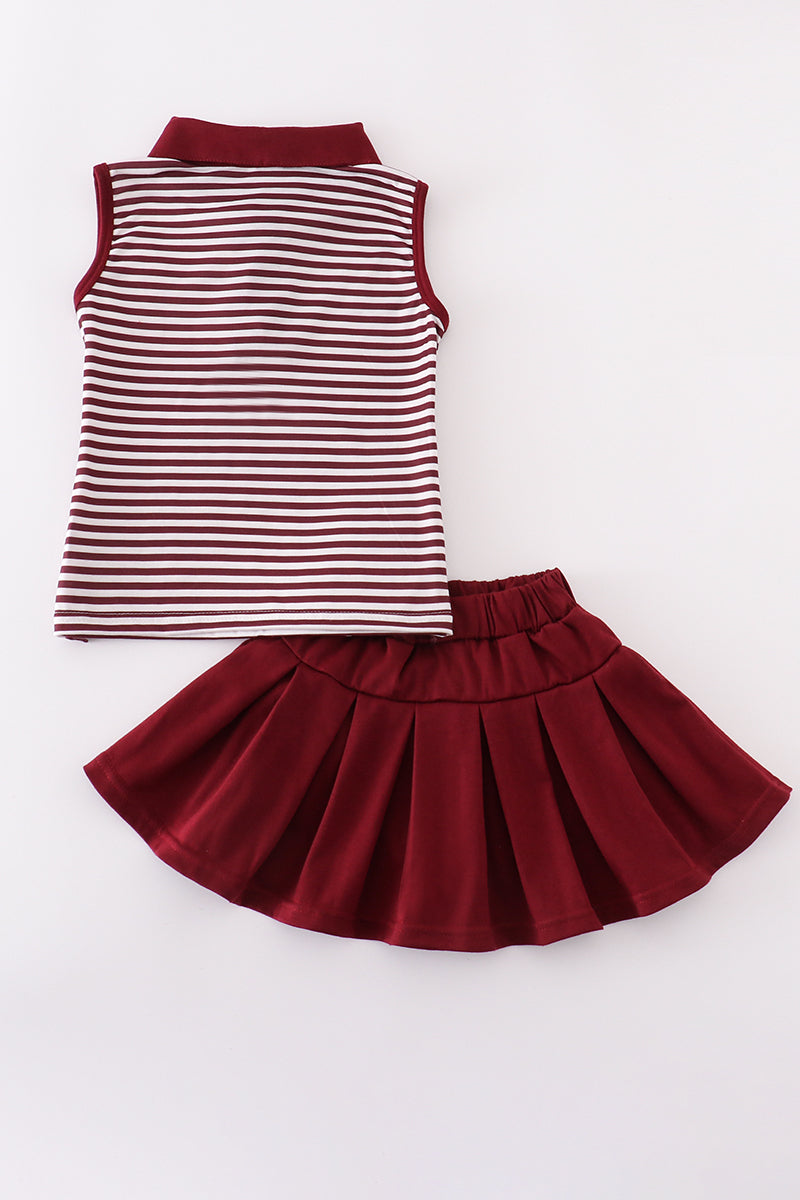 Maroon tennis set with "Mississippi" embroidery, perfect for playful adventures.