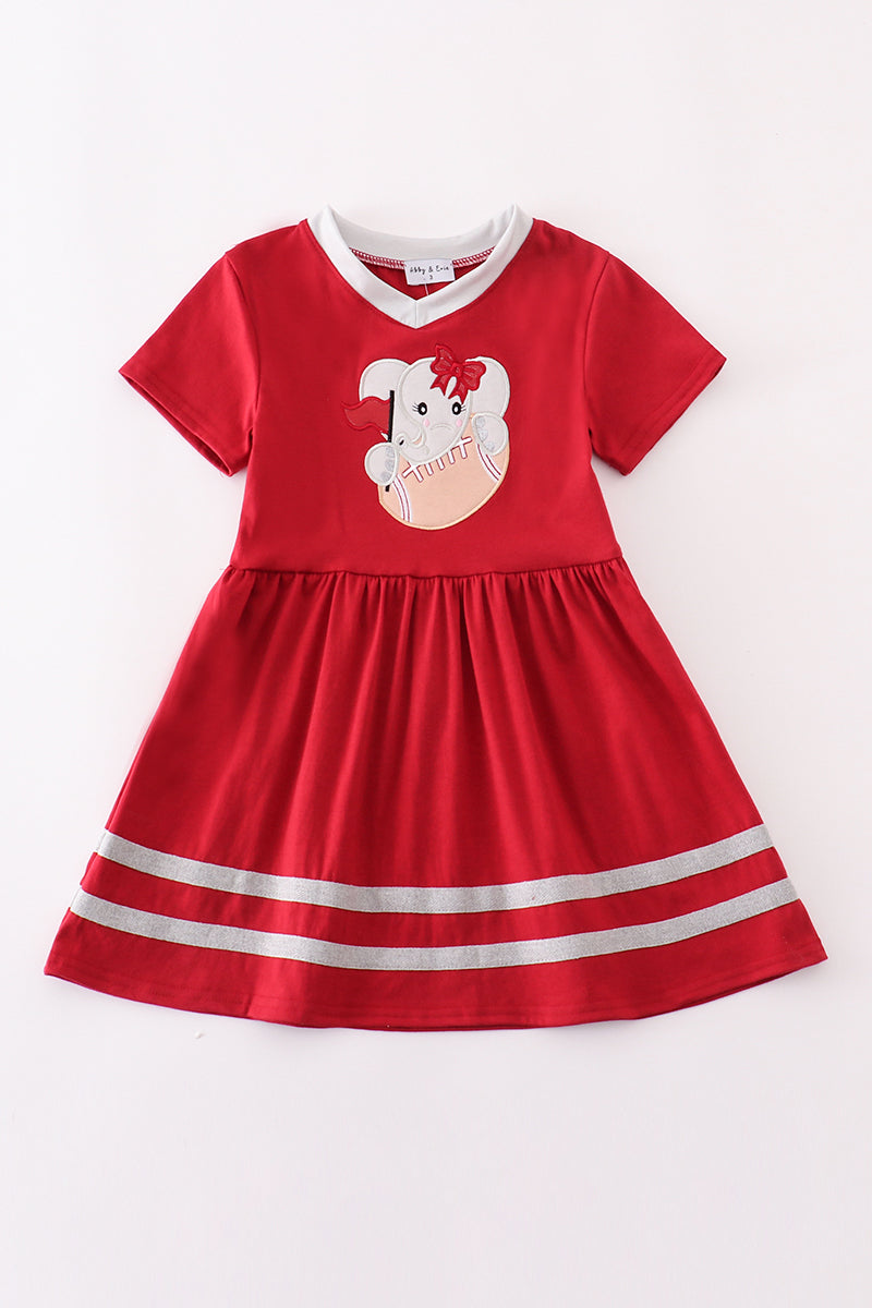Adorable red dress with an elephant football applique, perfect for game day.