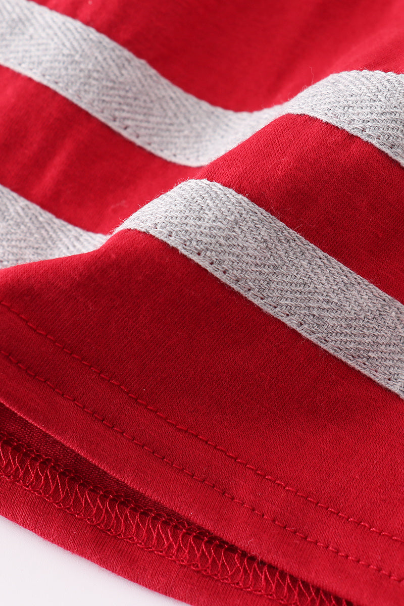 Adorable red dress with an elephant football applique, perfect for game day.