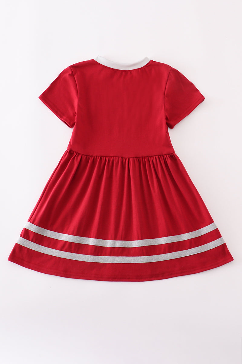 Adorable red dress with an elephant football applique, perfect for game day.