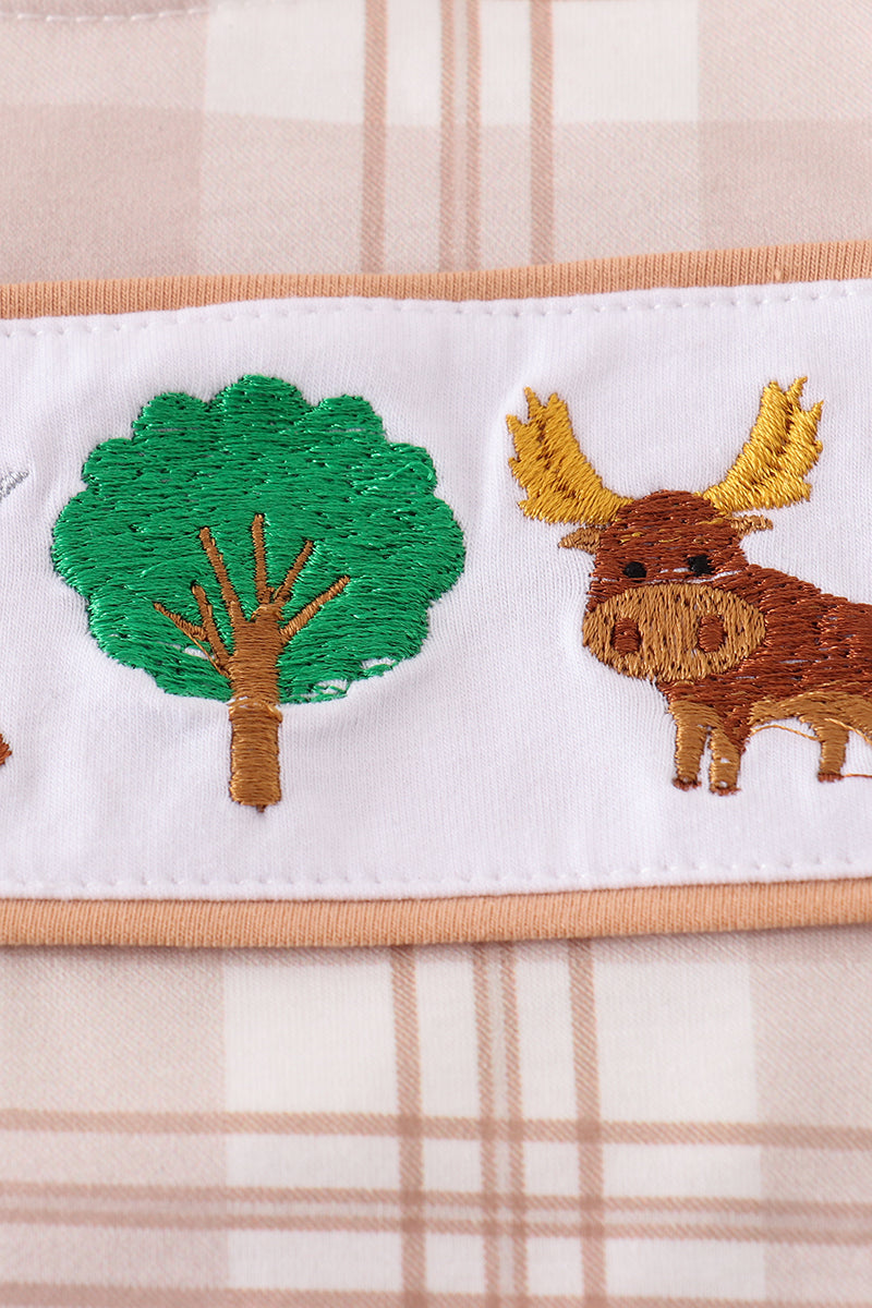 Khaki bubble romper with playful hunting embroidery, perfect for outdoor adventures.