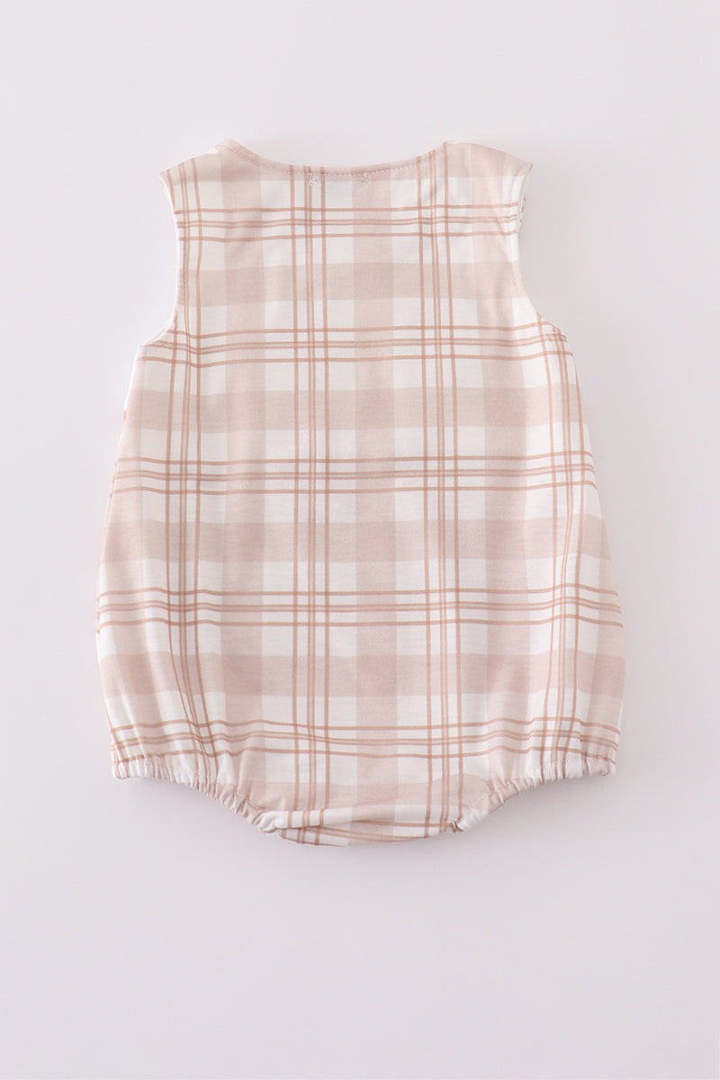 Khaki bubble romper with playful hunting embroidery, perfect for outdoor adventures.