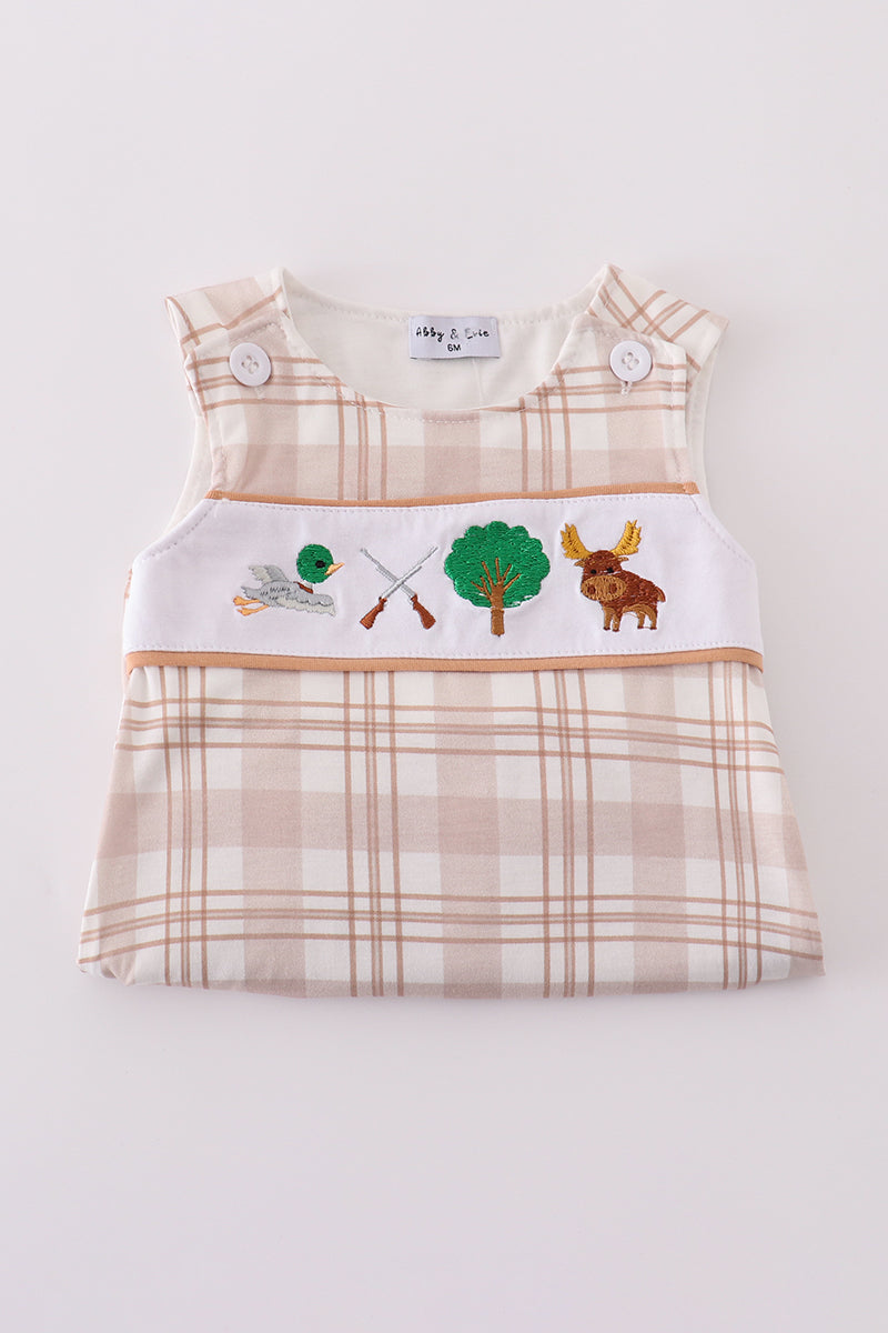 Khaki bubble romper with playful hunting embroidery, perfect for outdoor adventures.