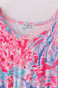Matching Pink Paradise Reef print mom&me dresses with vibrant coral and ocean patterns.