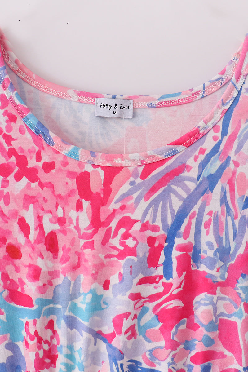 Matching Pink Paradise Reef print mom&me dresses with vibrant coral and ocean patterns.