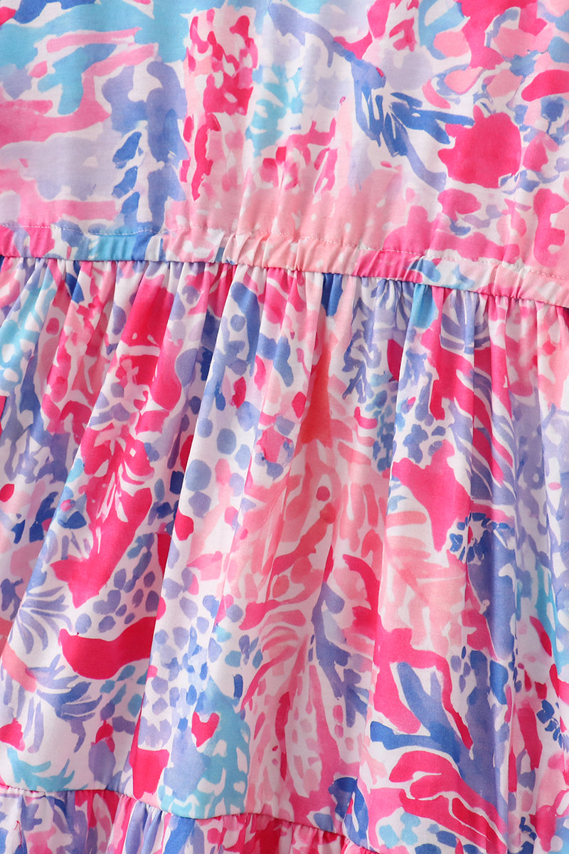 Matching Pink Paradise Reef print mom&me dresses with vibrant coral and ocean patterns.