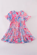 Matching Pink Paradise Reef print mom&me dresses with vibrant coral and ocean patterns.