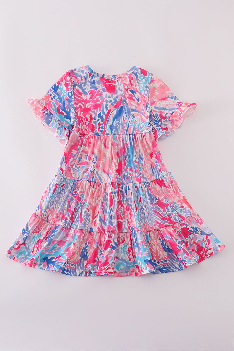 Matching Pink Paradise Reef print mom&me dresses with vibrant coral and ocean patterns.