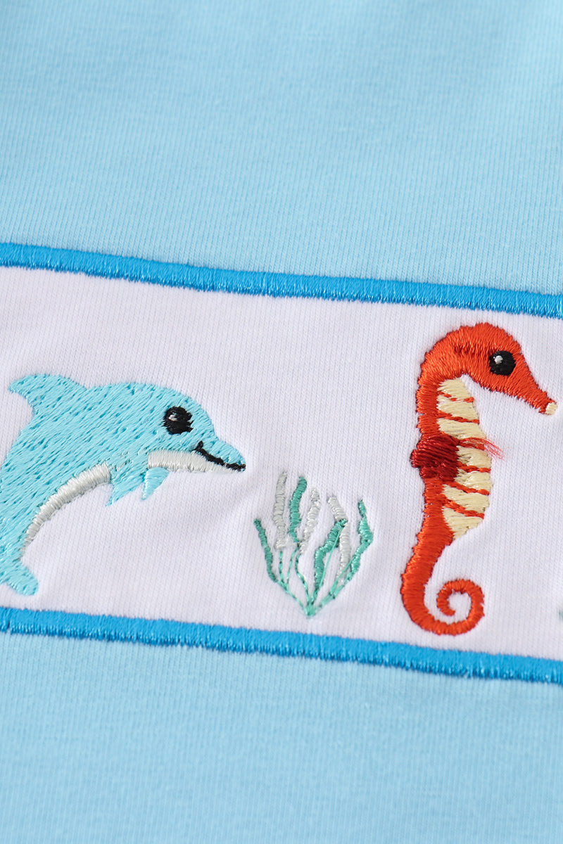 Blue marine creature embroidery set with playful sea animals, perfect for kids.
