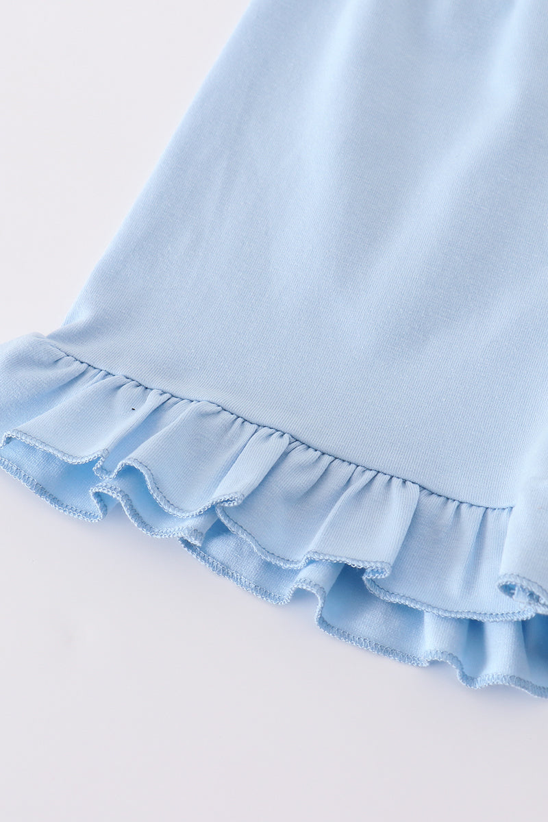 Adorable blue hydrangea print ruffle shorts set with a charming bow accent.