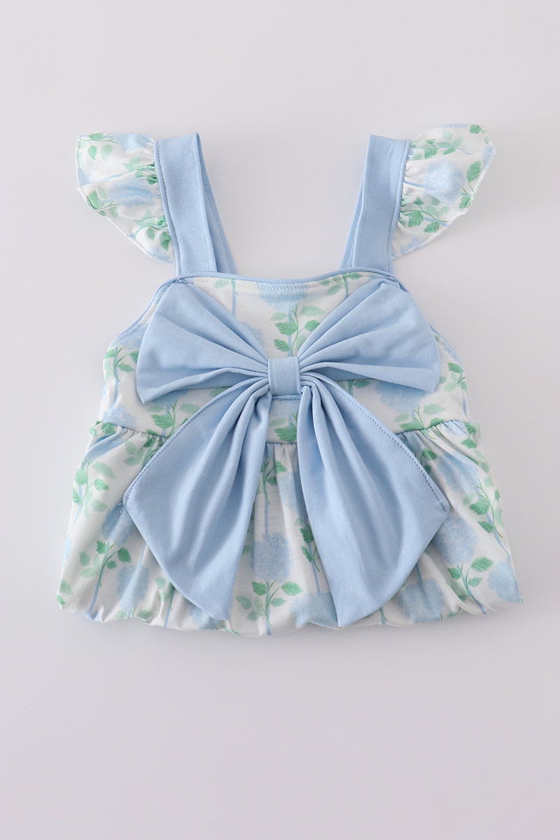 Adorable blue hydrangea print ruffle shorts set with a charming bow accent.