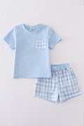 Blue gingham shorts set with playful pattern, perfect for sunny adventures.