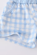 Blue gingham shorts set with playful pattern, perfect for sunny adventures.