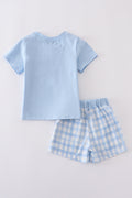 Blue gingham shorts set with playful pattern, perfect for sunny adventures.