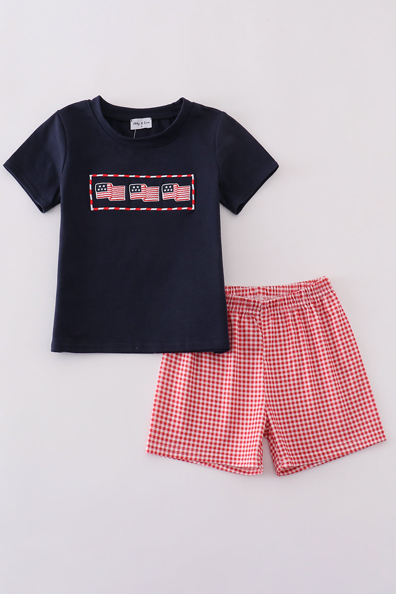 Navy shorts set with playful flag embroidery, perfect for summer adventures.