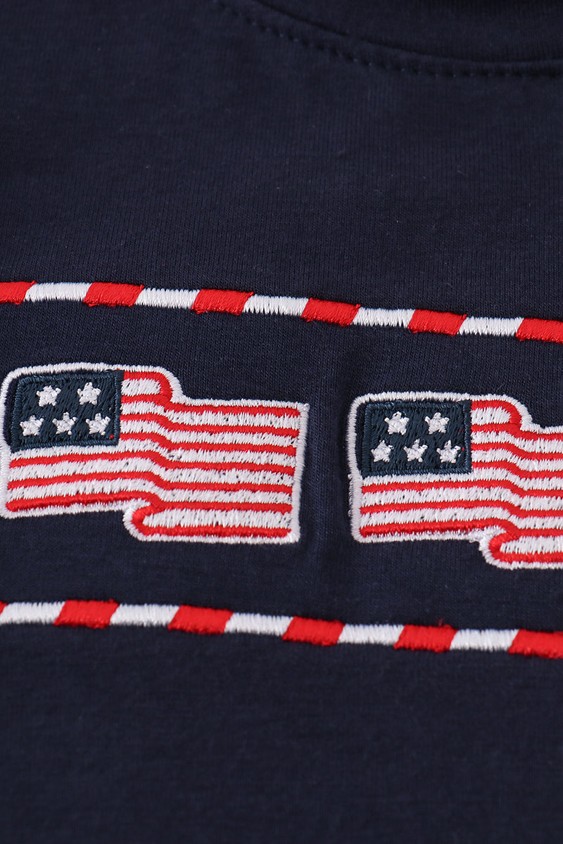 Navy shorts set with playful flag embroidery, perfect for summer adventures.