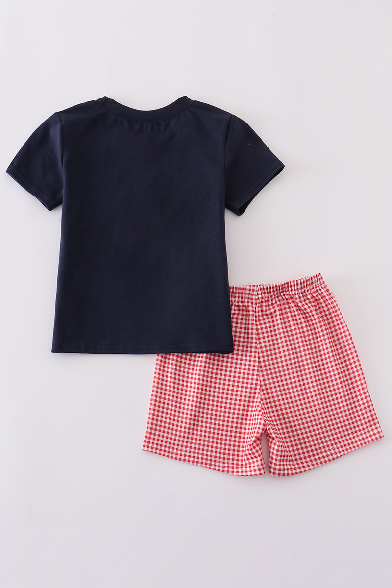 Navy shorts set with playful flag embroidery, perfect for summer adventures.